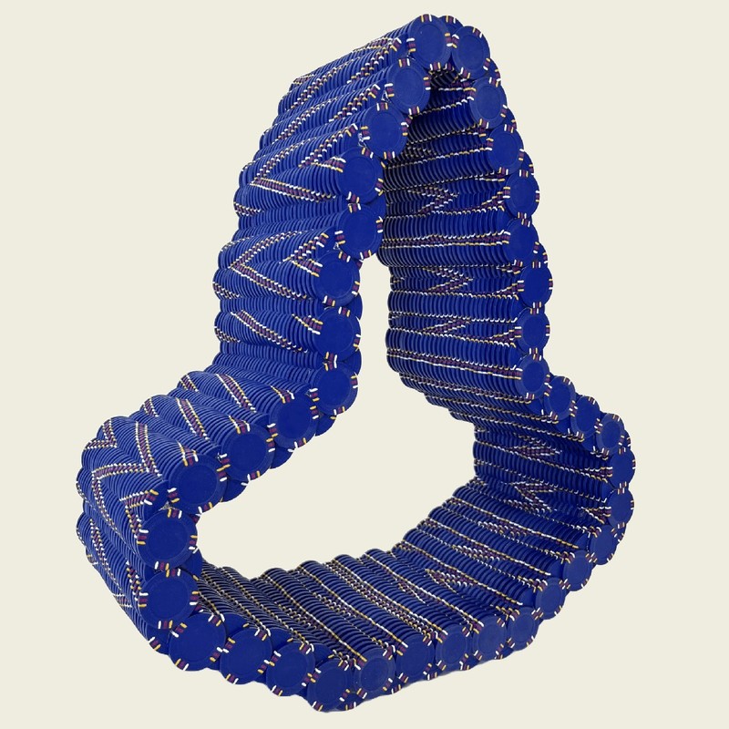 Namaste, 2023, poker chip sculpture by Stephen Giannetti, 21 by 19.5 by 7.5 inches, Davis California